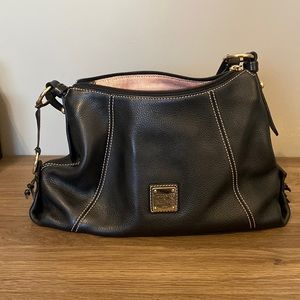 Dooney & Bourke Hobo bag (9”H x 5.25” W x 12.75”L) with pebbled black leather.